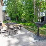 Enjoy alfresco dining in your private green oasis, complete with a grill for perfect summer BBQs.