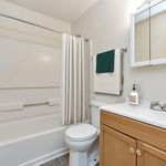 Experience comfort and style in this elegantly designed bathroom.