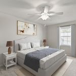 Experience relaxation in this elegantly designed bedroom, complete with modern amenities.