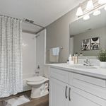 Experience the blend of style and comfort in this beautifully designed bathroom.