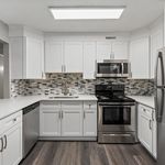 Step into sophistication with this sleek kitchen, perfect for culinary adventures.
