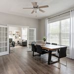 Experience seamless living in this elegant dining and living space, perfect for entertaining.
