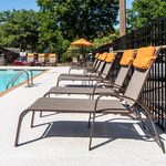 Experience ultimate relaxation at our stunning poolside retreat, complete with comfortable loungers.