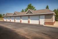 Charming townhouse garage view showcasing multiple secure and spacious private parking spaces with modern design and inviting atmosphere.