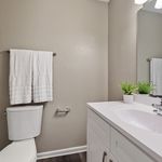 Chic bathroom with modern fixtures, elegant vanity, and tasteful decor, creating a relaxing oasis.