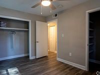Bedroom with bathroom and closet