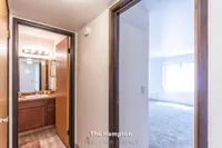 Inviting 1-bedroom apartment featuring a modern bathroom and sunlit living area in The Hampton, spanning 630 sq. ft.