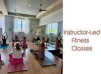 Bright yoga studio with natural light, featuring instructor-led fitness classes for a refreshing wellness experience.