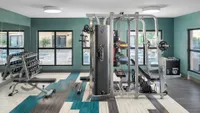 Fitness Center with Free Weights and Benchpress