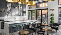 Resident Lounge with Bar, Hightop Seating and Lounge Chairs