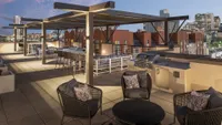Rooftop at Sunset with BBQ Station, Dining and Lounge Area