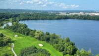 Scenic and unbuildable water and golf-course view out the window of Parkside Place, apartments in Cambridge MA with onsite garage parking