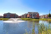 Apartment Exterior Next to Pond