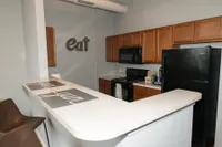 Modern Kitchen Featuring Black Appliances
