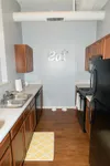 Modern Kitchen Featuring Black Appliances