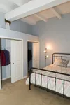 Modern Bedroom featuring Dual Closets