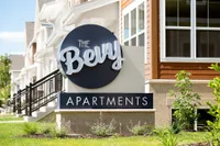 Stylish exterior view of The Bevy Apartments featuring modern architecture and inviting landscaping.