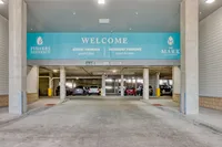 Secure and convenient parking garage entrance at The Mark Apartments, featuring designated guest and resident parking areas.