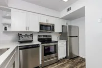 Kitchen with stainless steel appliances.