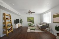 Penthouse living room with couch and tv