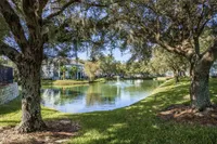 Lake and fountain with trees