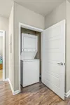 Stacked washer/dryer machine inside closet