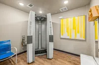 Verical tanning bed