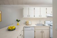 Kitchen with lemons and cookbook