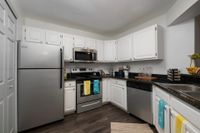 Kitchen with stainless steel appliances.