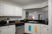 Kitchen with stainless steel appliances.