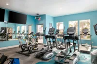 Community fitness center with various exercise equipment.