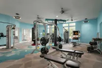 Community fitness center with various exercise equipment.