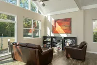 Community lounge with bookshelf and couch