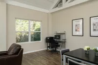 Community lounge with desk and computer