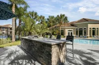 BBQ grill overlooking pool