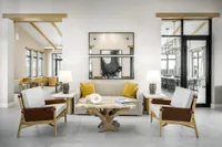 Clubhouse sitting area with couches and chairs