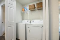 Laundry closet with washer and dryer