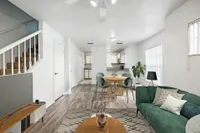 Living room, dining area and kitchen