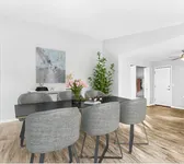 Experience the airy ambiance of our open-concept living spaces, enhanced by vaulted ceilings that invite natural light and offer a sense of grandeur. Great Room