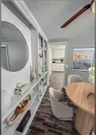 Conveniently located off the kitchen, this inviting dining space is filled with natural light and perfect for daily dining. Dining Area