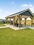 Entertain with ease at our community pavilion—complete with shaded seating, built-in grills, and space to gather with neighbors and friends. Paviliion & Picnic Are