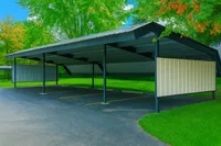 Rain or shine, your vehicle stays protected with our modern covered carports—designed for comfort, convenience, and peace of mind. Inviting covered parking area amidst lush greenery, providing secure and convenient parking solutions.