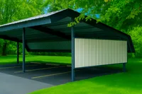 Covered carports mean no more early morning snow scraping—enjoy the convenience of protected parking year-round, especially when the weather turns cold. Charming covered parking area surrounded by lush green grass and vibrant trees, offering convenient and scenic protection for your vehicle.