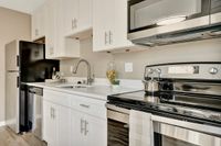 Stainless steel appliances in Kitchen