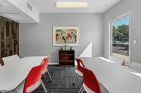 Quiet study lounge at Raiders Walk with desks, chairs, and plenty of natural light