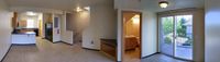 #2 - Living Area, Half Bath, Balcony, Kitchen and Stairs