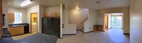 #2 - Living Area, Half Bath, Balcony, Kitchen and Stairs