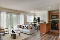 Open Floorplan. Black appliances. Kitchen island. Living and dining space. Balcony with great natural sunlight.