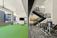 Modern Apartments in Phoenix AZ - Meritum Sheely Farms - Indoor-Outdoor Fitness Center Featuring Workout Equipment