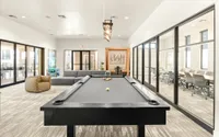 Dog-Friendly Apartments in West Phoenix, AZ - Meritum Sheely Farms - Amenity Rich Community with Community Spaces - Pool